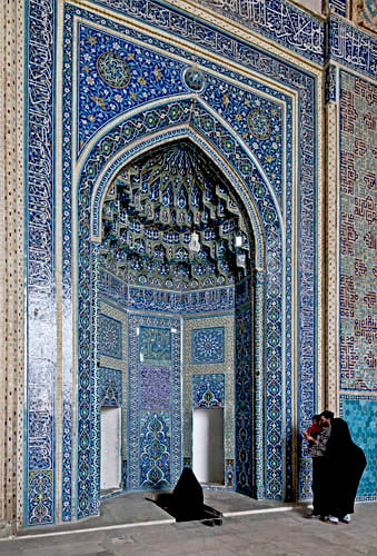 Friday Mosque (Masjed-e Jameh), built in the fifteenth century for Sayyed Roknaddin, mihrab and women worshippers, Yazd, Iran